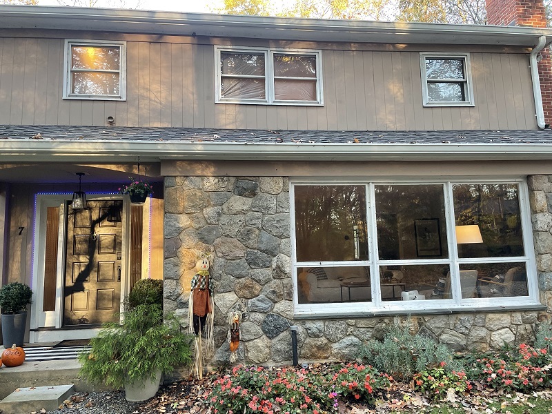Classic Wilton home in need of a window replacement